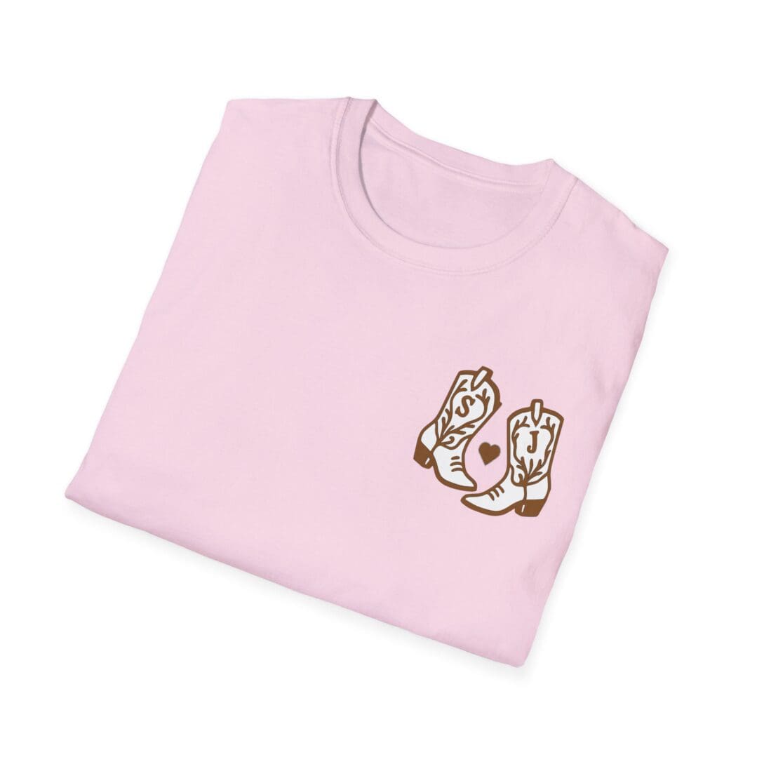 Pink t-shirt with cowboy boots design.